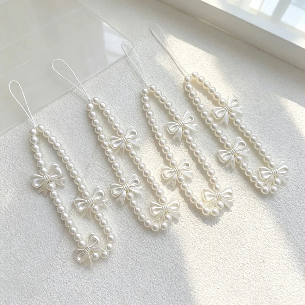 Women Sweet White Beaded Wrist Strap for Mobile Phone Fashion Bowknot Pearl Lanyard Short Hand Chain for Cellphone Key Bag Charm