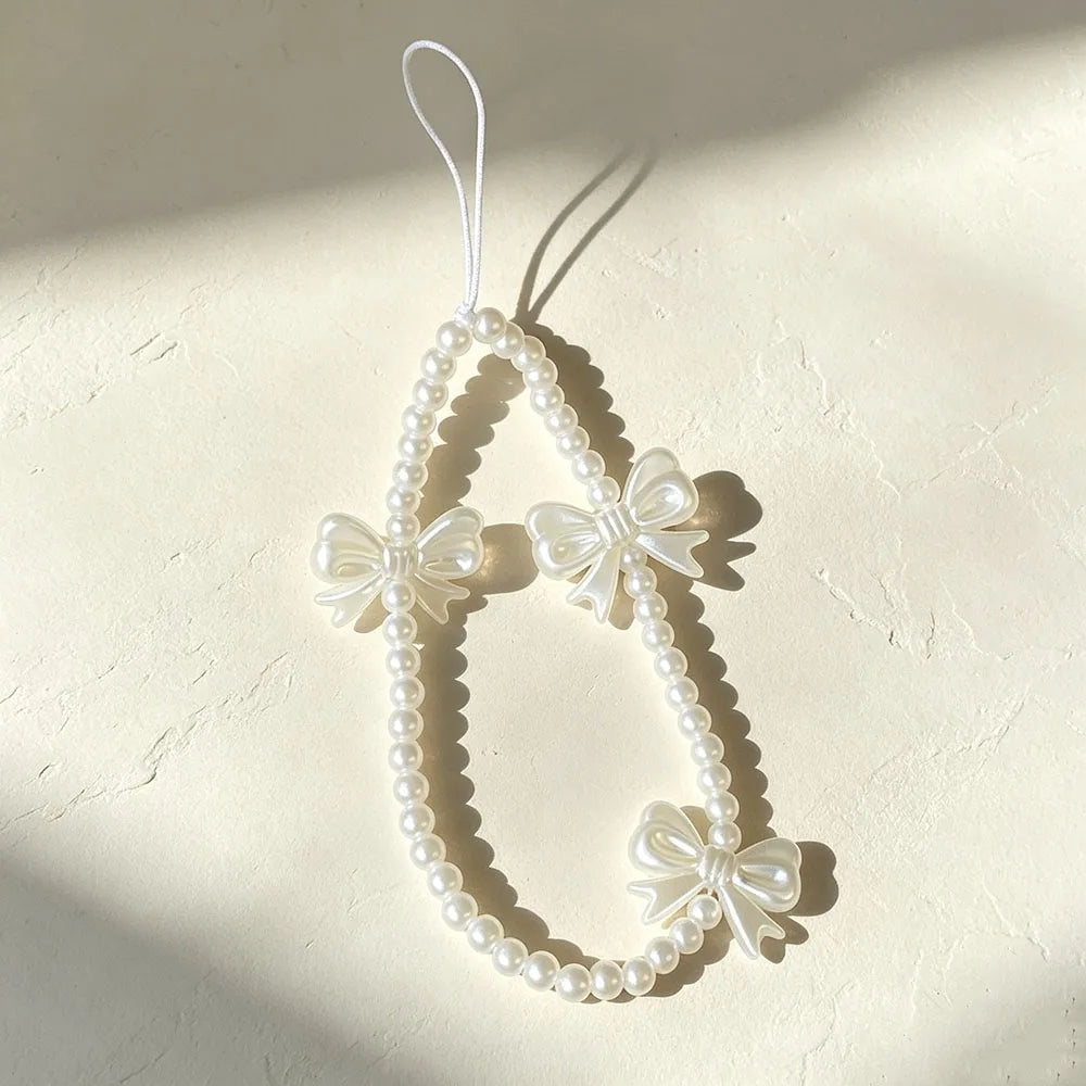 Women Sweet White Beaded Wrist Strap for Mobile Phone Fashion Bowknot Pearl Lanyard Short Hand Chain for Cellphone Key Bag Charm
