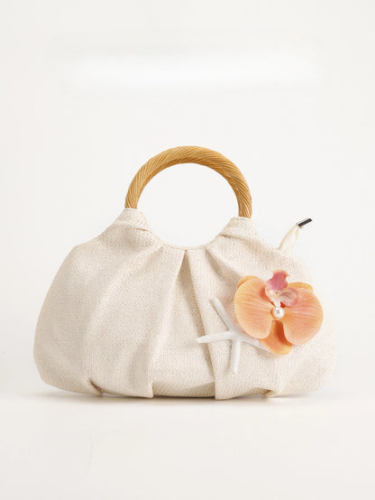 New straw handbag women's summer niche design bamboo bag high-end flower decoration
