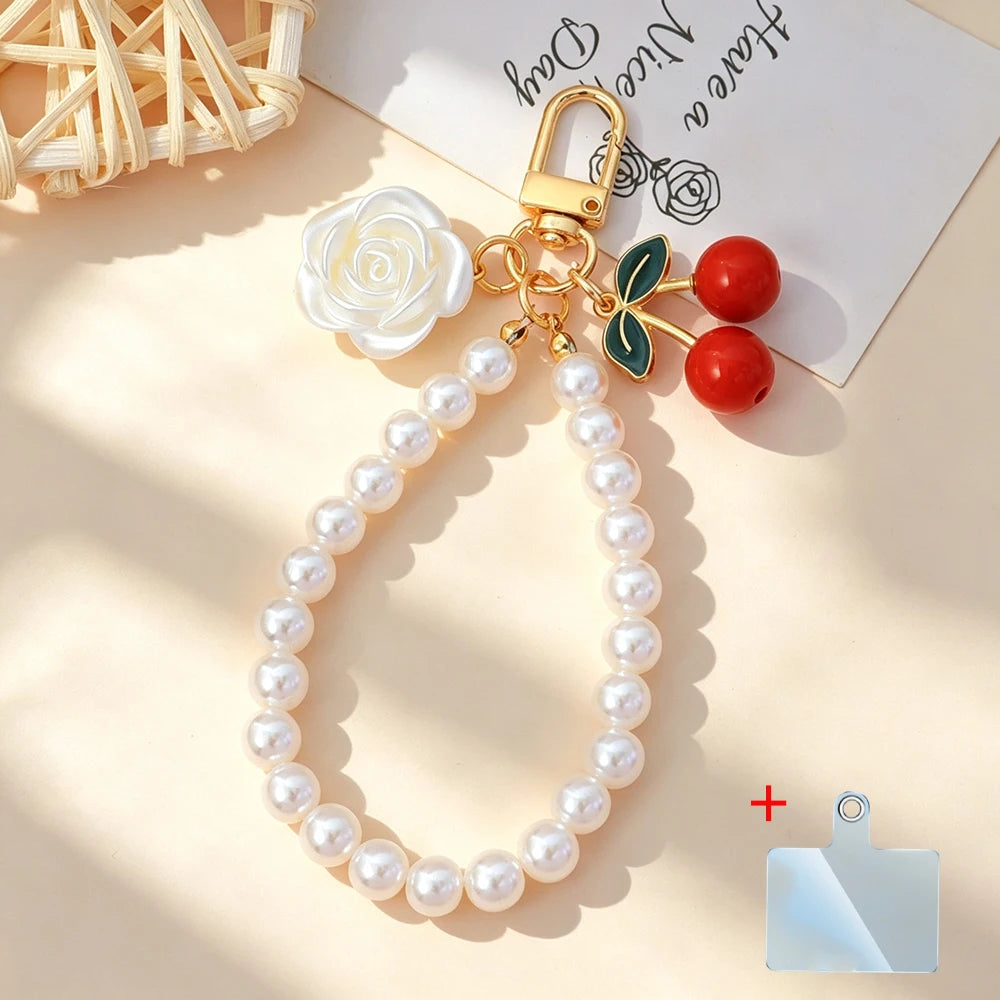 Elegant Imitation Pearl Wrist Phone Lanyard with Cherry Pendant Cute Bow Leaf Keychain Bag Charm Anti-lost Phone Strap for Women