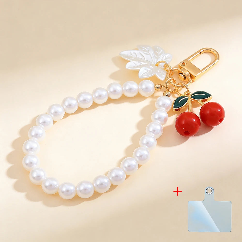 Elegant Imitation Pearl Wrist Phone Lanyard with Cherry Pendant Cute Bow Leaf Keychain Bag Charm Anti-lost Phone Strap for Women
