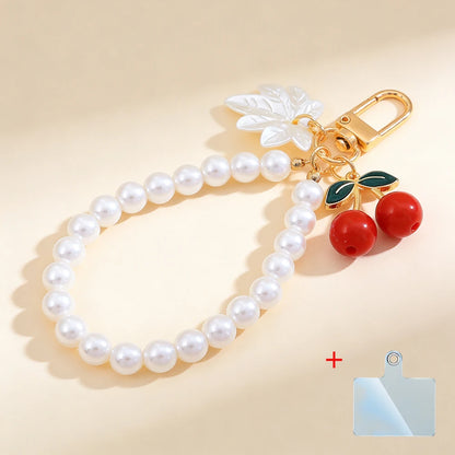 Elegant Imitation Pearl Wrist Phone Lanyard with Cherry Pendant Cute Bow Leaf Keychain Bag Charm Anti-lost Phone Strap for Women
