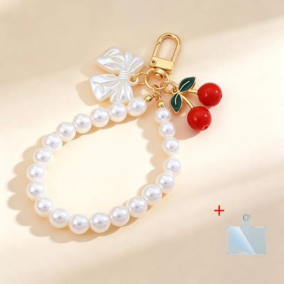 Elegant Imitation Pearl Wrist Phone Lanyard with Cherry Pendant Cute Bow Leaf Keychain Bag Charm Anti-lost Phone Strap for Women