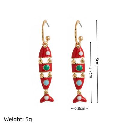 Golden fish shaped oil drop gold-plated earrings