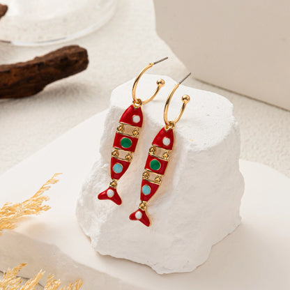 Golden fish shaped oil drop gold-plated earrings