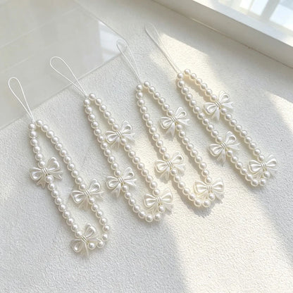 Women Sweet White Beaded Wrist Strap for Mobile Phone Fashion Bowknot Pearl Lanyard Short Hand Chain for Cellphone Key Bag Charm